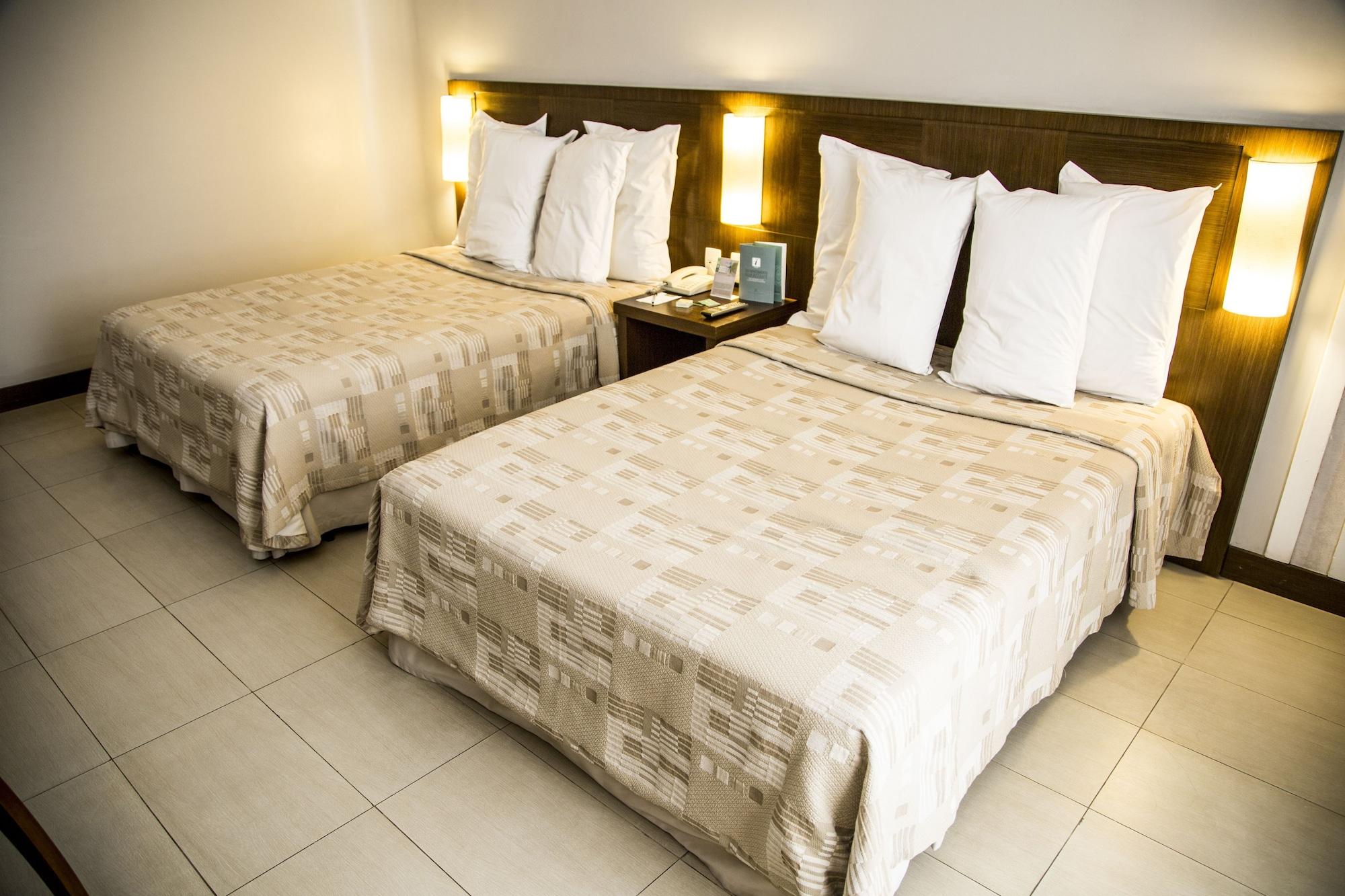 Parque Balneario Hotel Santos By Castelo Itaipava ภายนอก รูปภาพ A room at the hotel