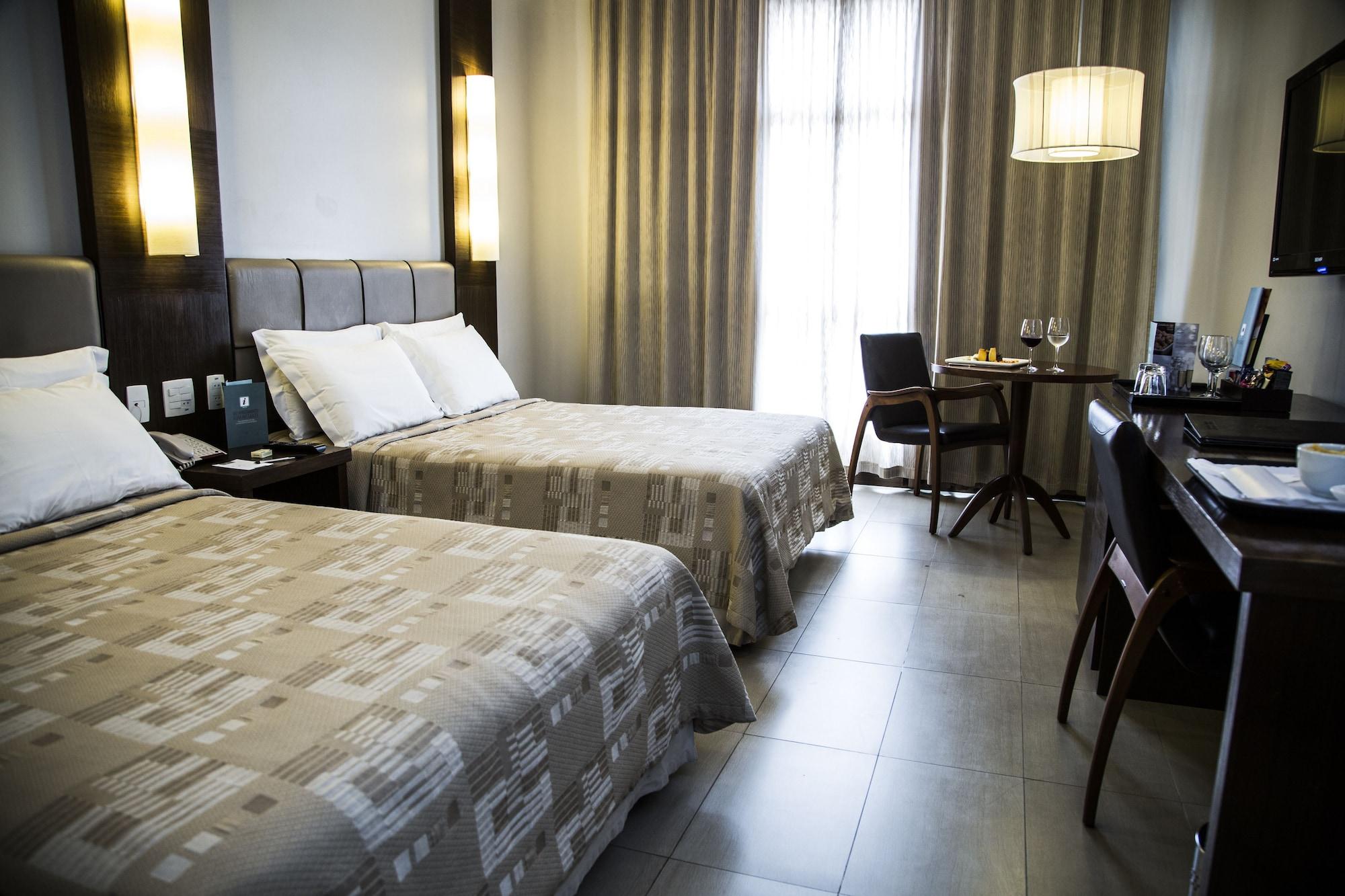 Parque Balneario Hotel Santos By Castelo Itaipava ภายนอก รูปภาพ A room at the hotel