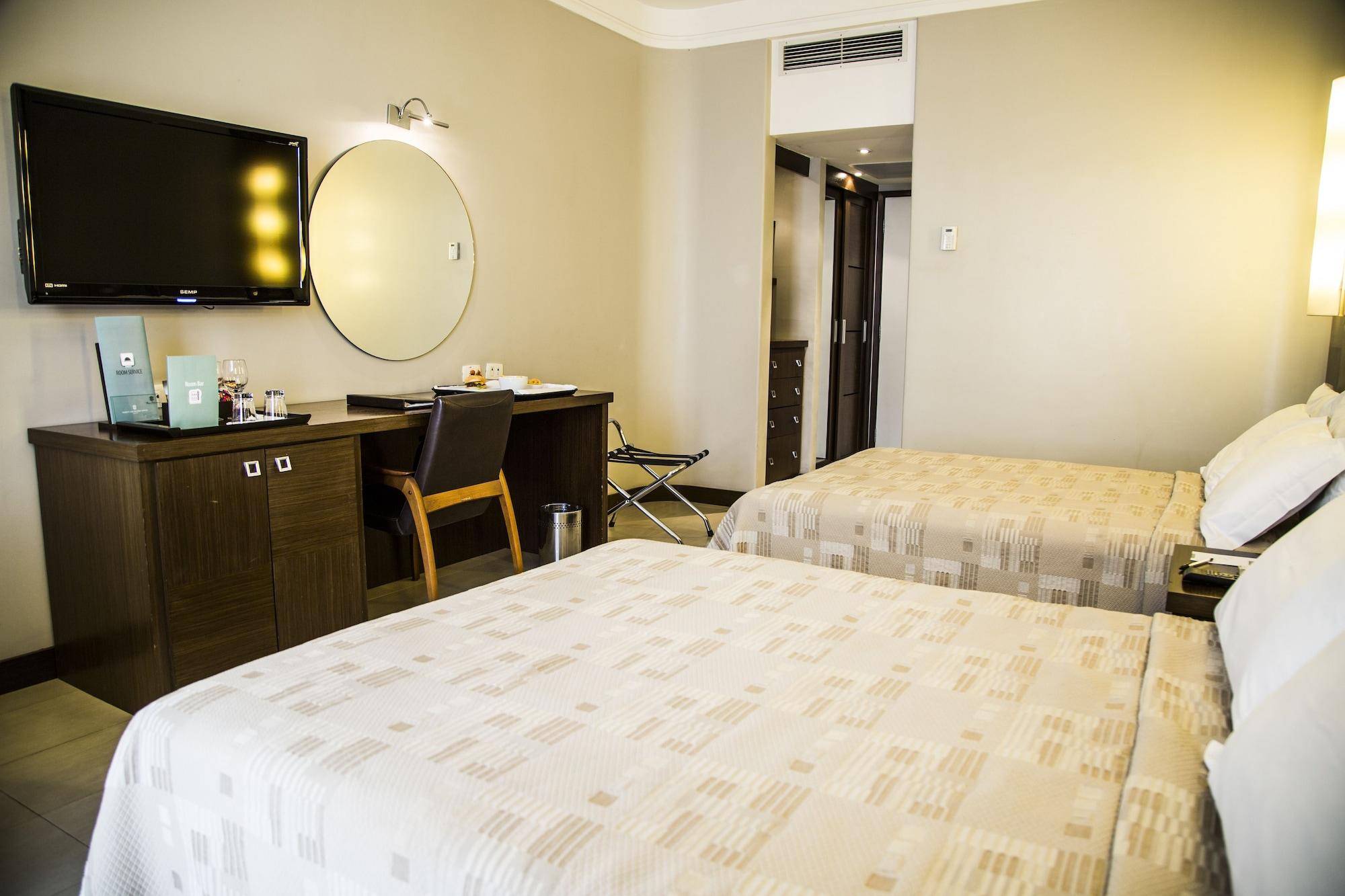 Parque Balneario Hotel Santos By Castelo Itaipava ภายนอก รูปภาพ A room at the hotel