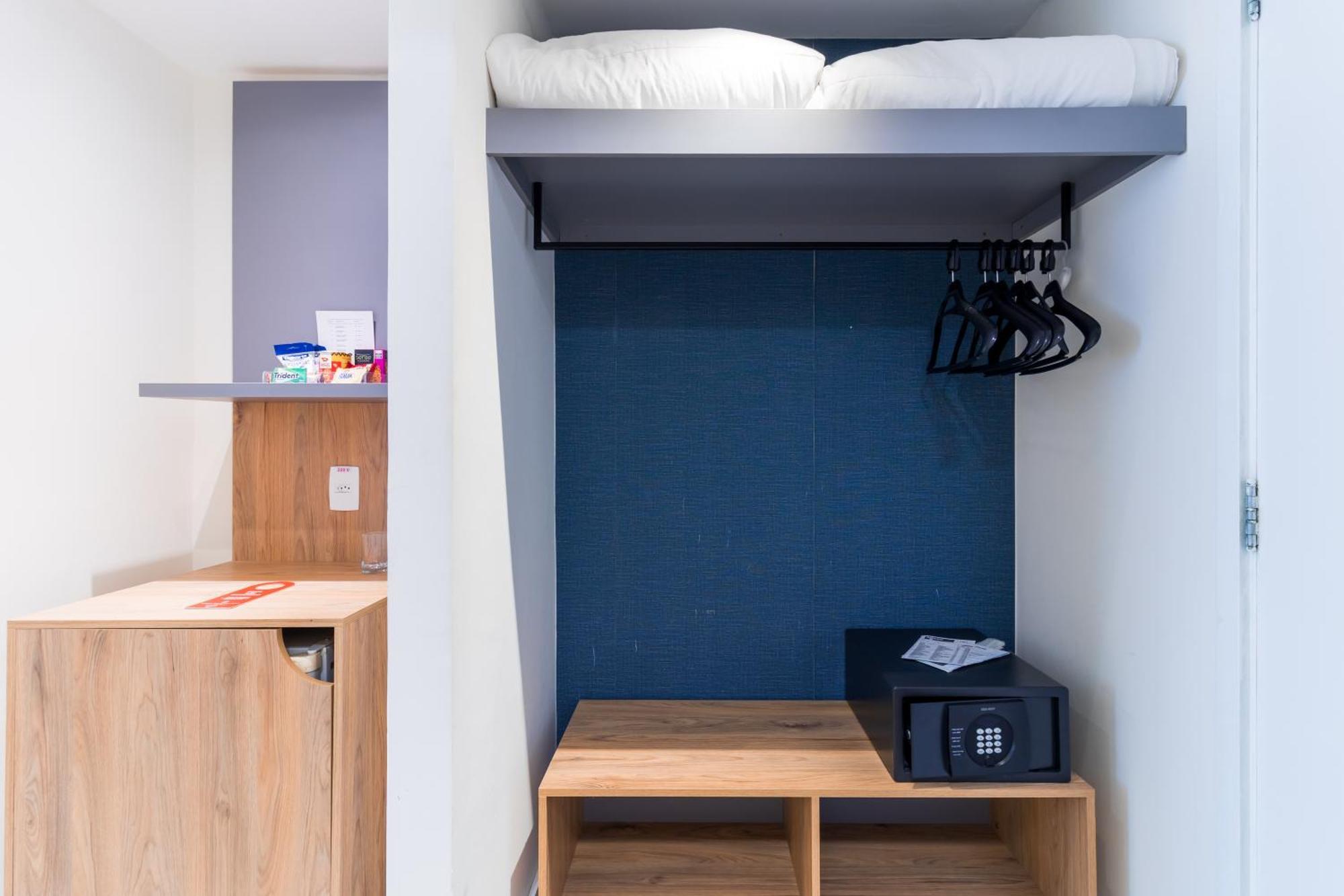 Parque Balneario Hotel Santos By Castelo Itaipava ห้อง รูปภาพ A typical bedroom in the new halls of residence