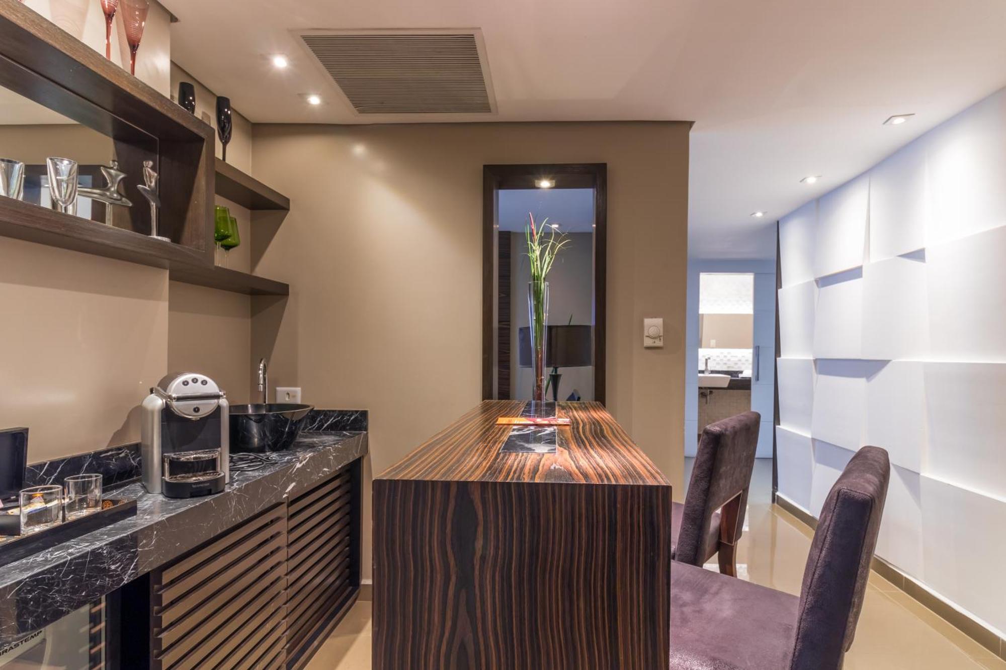Parque Balneario Hotel Santos By Castelo Itaipava ภายนอก รูปภาพ A kitchen in a serviced apartment in Hong Kong