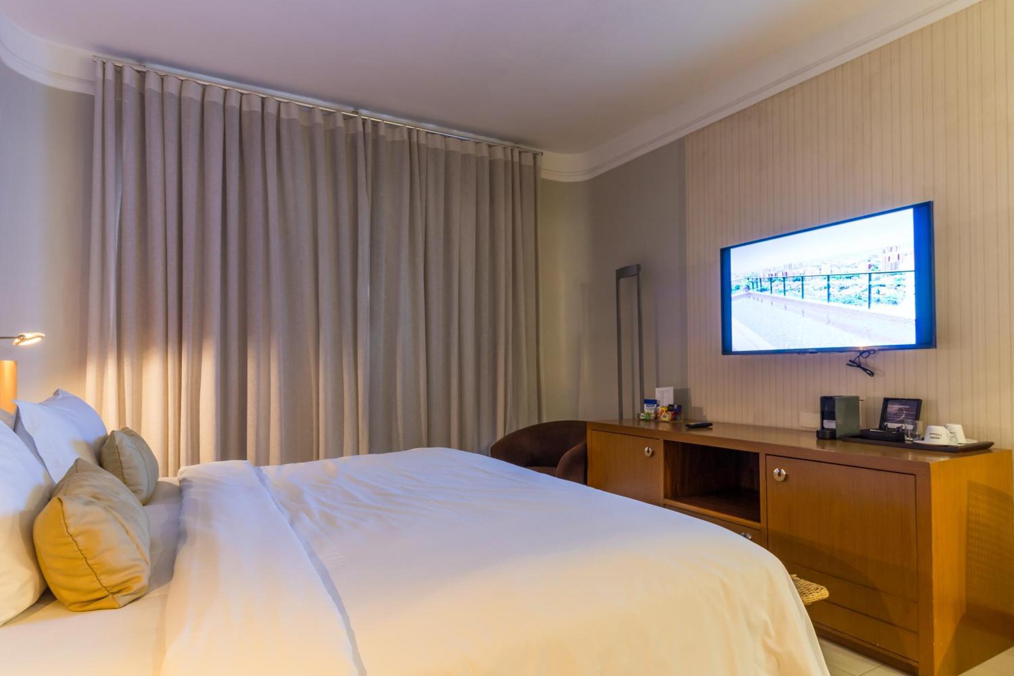 Parque Balneario Hotel Santos By Castelo Itaipava ภายนอก รูปภาพ A bedroom at the hotel